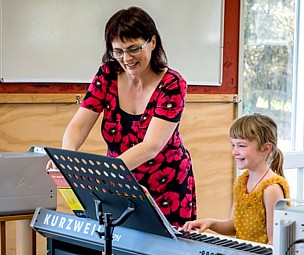 Nicole with piano student at WMS Concert