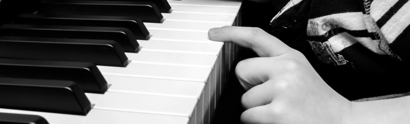 child on piano